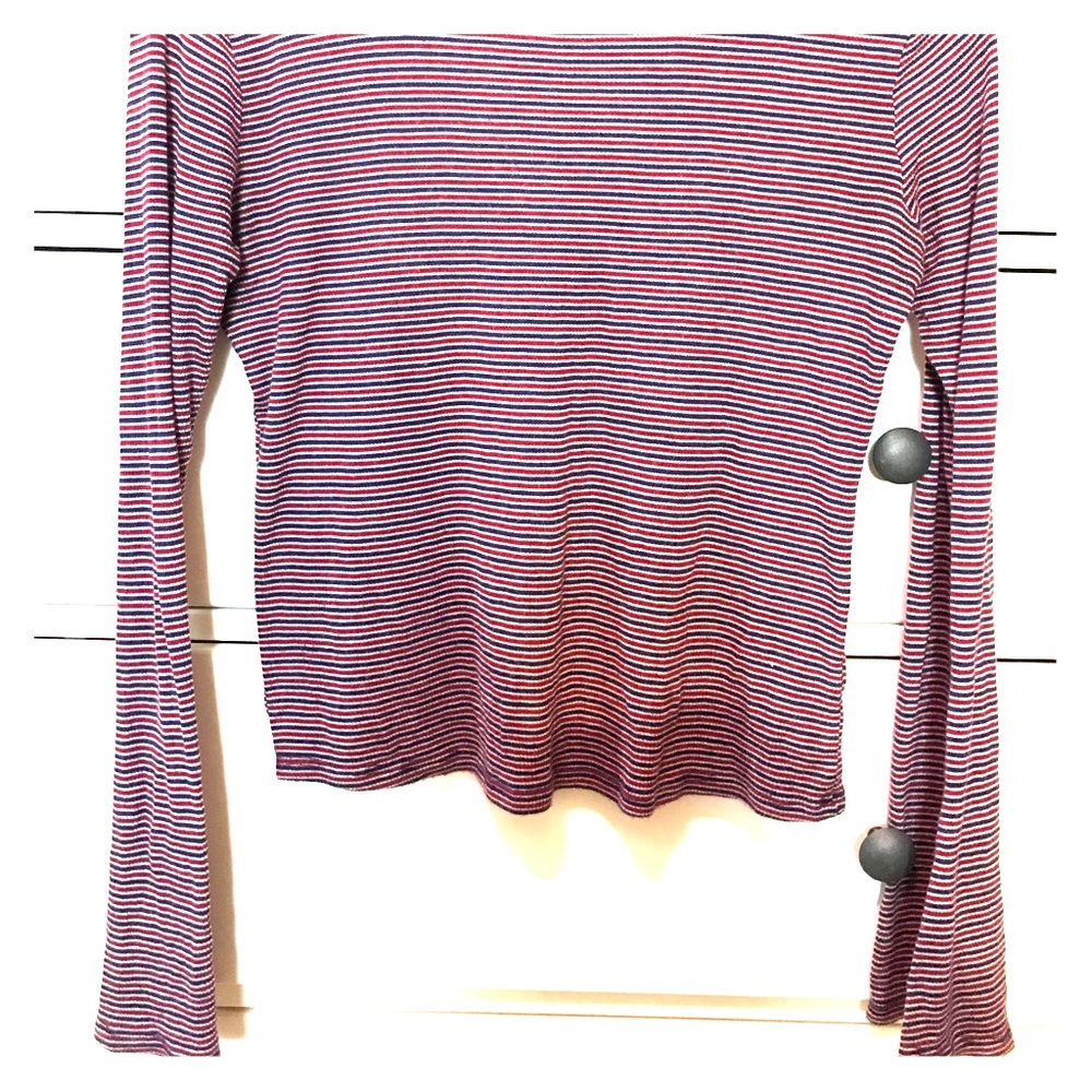 Blue, white, and red striped long sleeve top